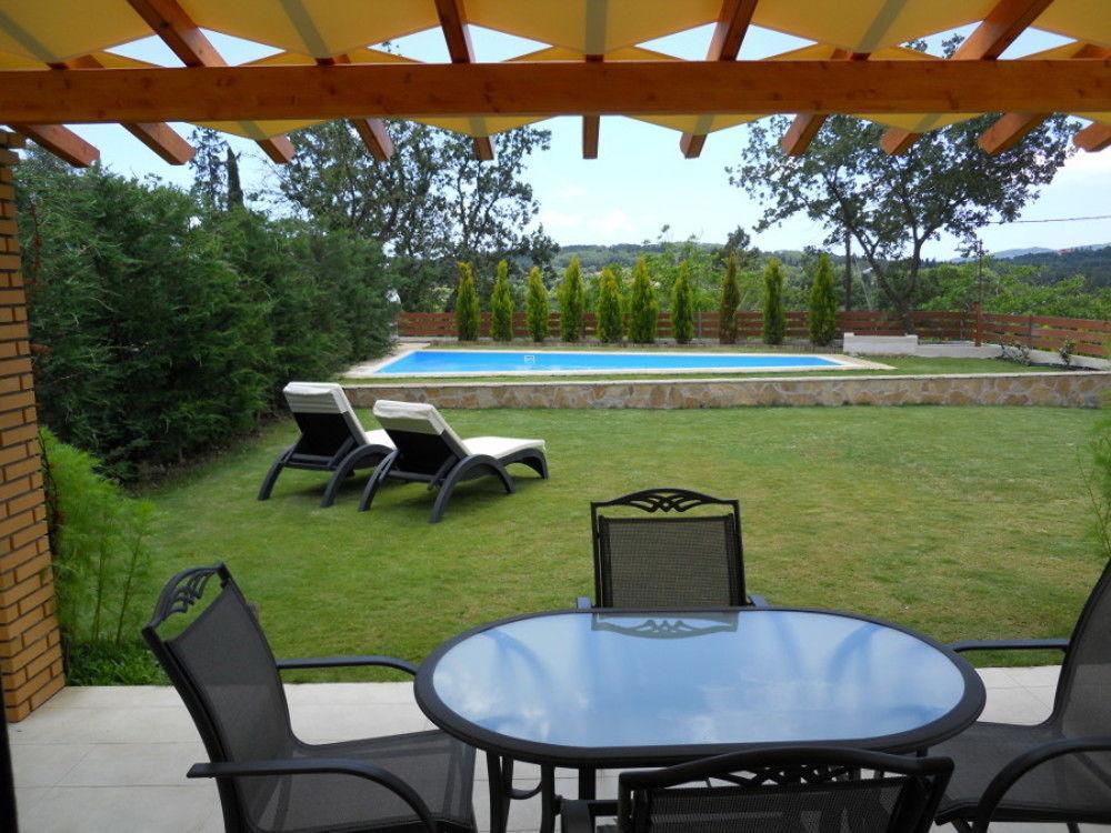 Villa Poulades กูเวีย ภายนอก รูปภาพ